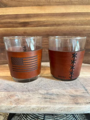 Glass tumblers with decorative leather wraps