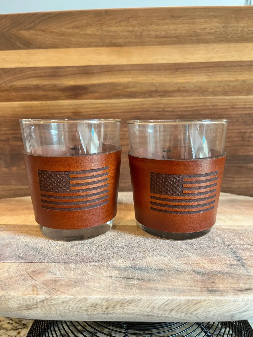 Whiskey glasses with leather American flag wrap.